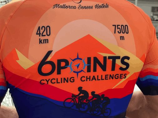 A cyclist's back with an event logo