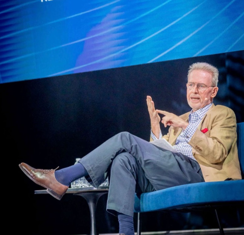 A woman offering a bag of donations
