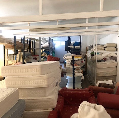 The shelter's storage filled up with mattresses and bedlinen