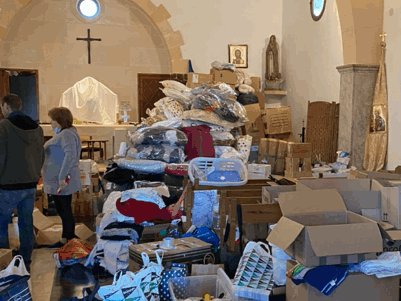 Piles of donations inside a church